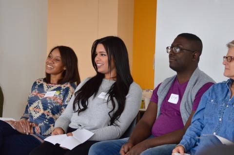 A group of teachers listening during a training session.