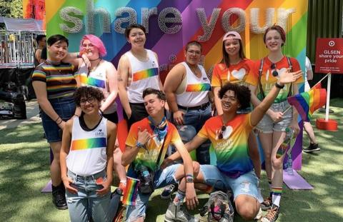 students leaders in rainbow gear at a pride festival